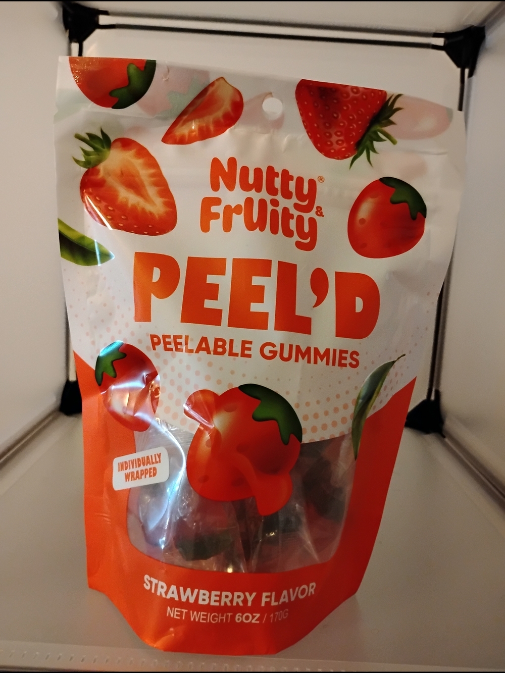 Nutty & Fruity PEEL'D Strawberry Peelable Gummies - Orange & White Packaging